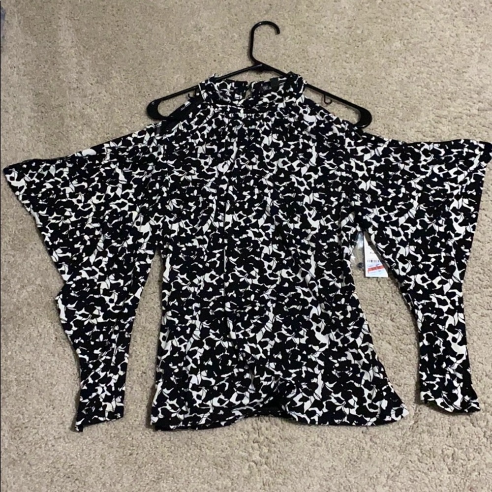 NEW. INC dressy blouse. Size XL.